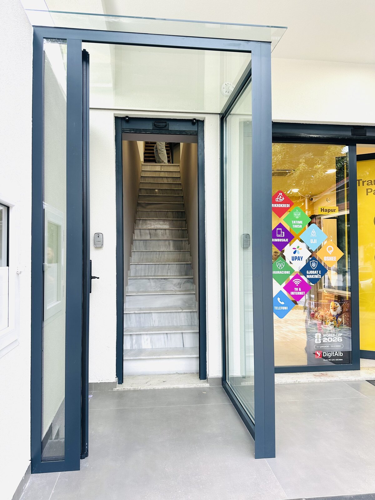 Entrance of Tanushi Central Apartments building